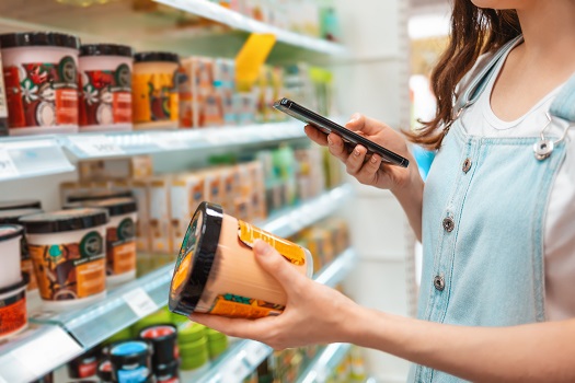 Woman using nfc on a product